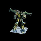Metallic robot figure on a clear stand against a black background