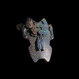 Sparkly, multicolored spaceship model on a black background