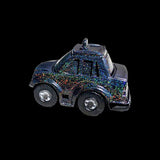 Sparkly toy truck on a black background