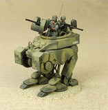 Model of a military vehicle with soldiers on a beige background