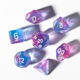 Set of colorful polyhedral dice on a white background