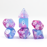 Set of colorful polyhedral dice with numbers on a white background