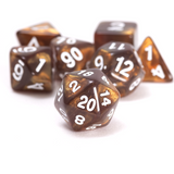 Set of polyhedral dice with brown and clear faces on a white background
