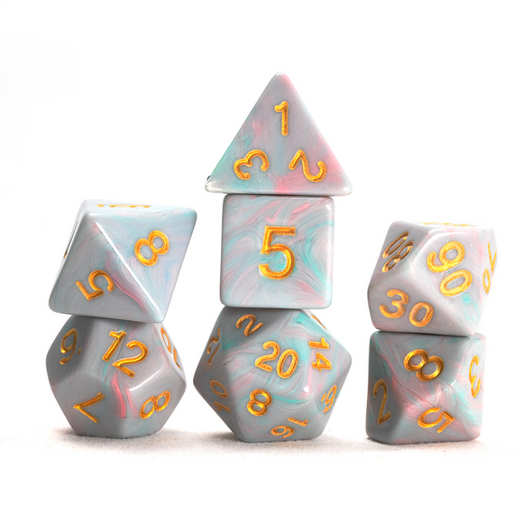 Set of marbled dice with yellow numbers on a white background