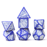 Set of blue polyhedral dice with white numbering and symbols on a white background