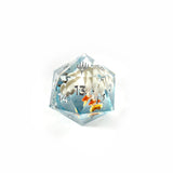 Clear polyhedral die with numbers on a white background