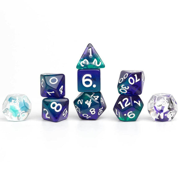 Set of polyhedral dice with blue and green colors on a white background