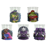 Set of five glass tumblers with character-themed bases on a white background