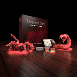 Resident Evil board game set with box, figures, and cards on a wooden surface.