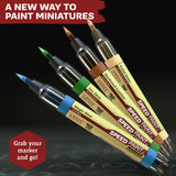 Set of mini paint markers with color names on a dark background