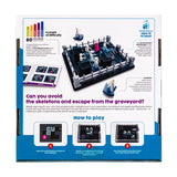 Board game packaging with puzzle pieces and skeleton figures on a white background