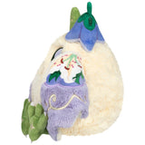 Plush toy resembling a character from a snow globe with a white background