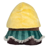 Plush toy resembling a character with a yellow hood, green striped skirt, and brown body on a white background