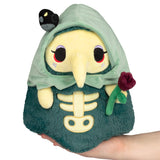 Plush toy with skeleton design and hood on a white background
