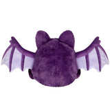 Purple plush toy with bat wings on a white background