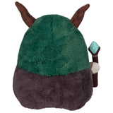 Plush toy with green top and brown bottom on a white background