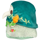Plush toy with a green hood and floral decorations on a white background