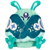 Plush toy with teal and green colors on a white background