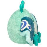 Plush toy with green and blue colors on a white background