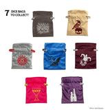 Set of seven dice bags with various designs on a white background