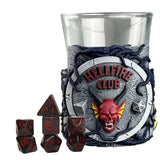 Decorative glass with 'Hellfire Club' design and dice set on a white background