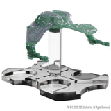 Decorative object with green dragon-like creature on a metallic base