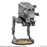 Assembled model of a Star Wars AT-AT robot on a white background