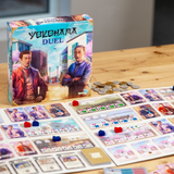 Board game 'Yokohama Duel' with cards and pieces on a table