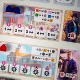 Board game components including cards and player characters on a table