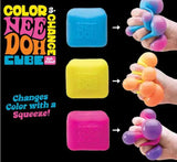Color Nee Doh Cube with colorful gel balls and text on a black background