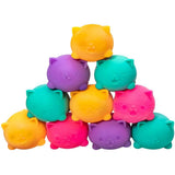 Colorful cat-shaped toys stacked on a white background