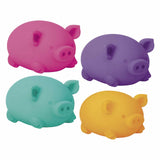 Four colorful pig-shaped objects on a white background