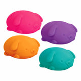 Four colorful pig-shaped bath toys on a white background