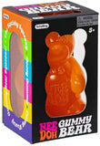 Boxed orange gummy bear toy with colorful packaging