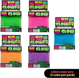 Assorted packages of 'Nice Doh Cube Glow' in various colors on a white background.