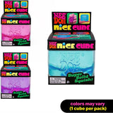 Display of Nee Doh Nice Cube packaging with colorful cubes inside