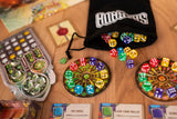 Board game components including dice and cards on a wooden table with a 'Boggle' bag.
