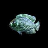 Decorative fish ornament on a black background