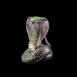 Metallic cobra sculpture on a black background