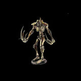 Metallic creature figurine on a black background