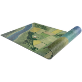 Rolling out green and blue patterned rug on a white background