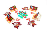 Colorful game pieces and cards on a white background