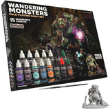 Wandering Monsters role-playing paint set with paint bottles, brush, and miniatures on a white background