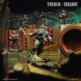 Miniature figurines from 'Trench Crusade' with a warrior in armor holding a sword, surrounded by other figures in a battle scene.
