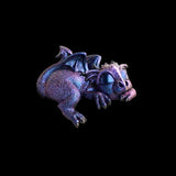 Colorful dragon figurine on a black background