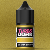 Bottle of Turbo Dork metallic paint with black cap on a gold background