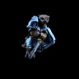 Metallic figurine of a character with a sword on a black background