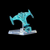 Turquoise spaceship model on a clear stand against a black background