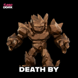 Wooden figurine with 'Turbo Dork' branding and 'DEATH BY' text on a black background