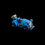 Blue toy car with a black background